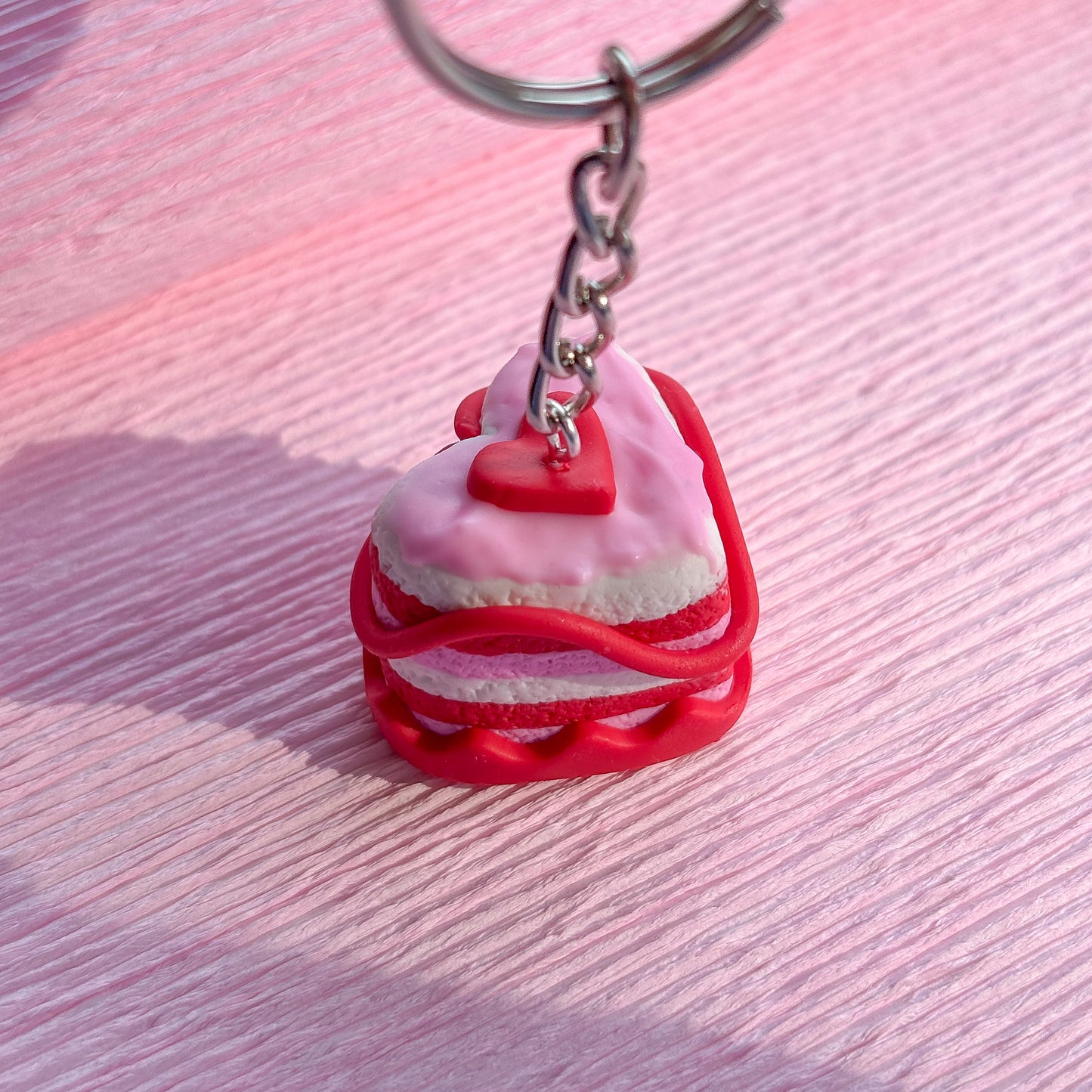 Crimson Swirl Cake Keychain