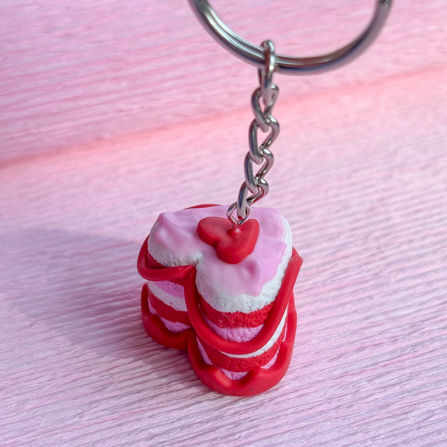 Crimson Swirl Cake Keychain